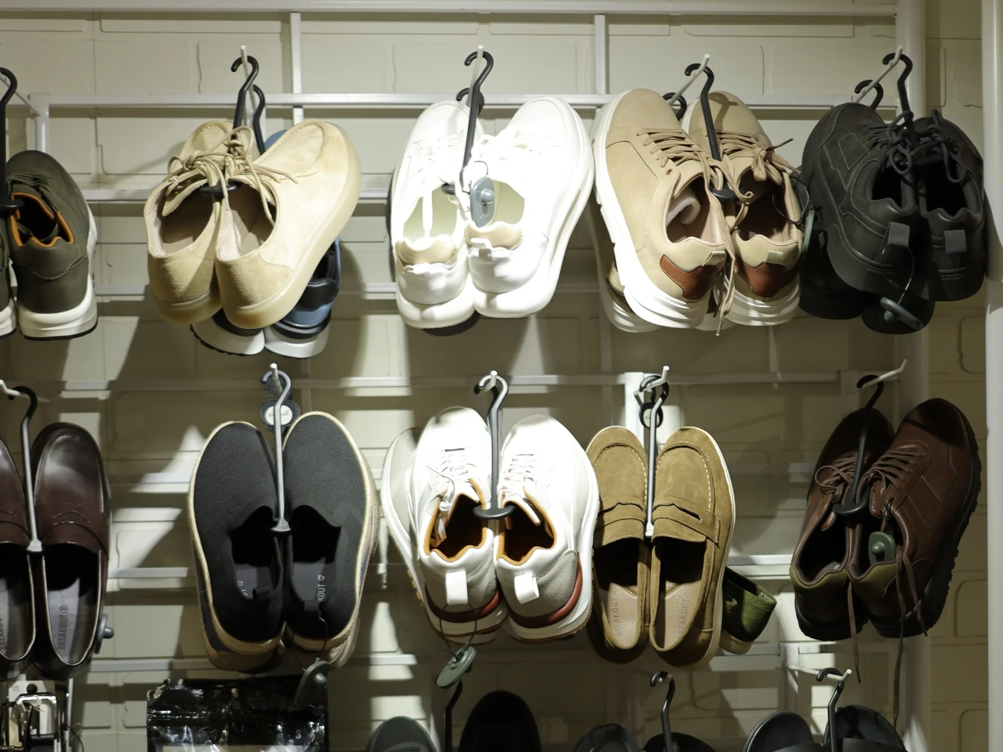 A wall of trainers and canvas shoes at BREAKOUT