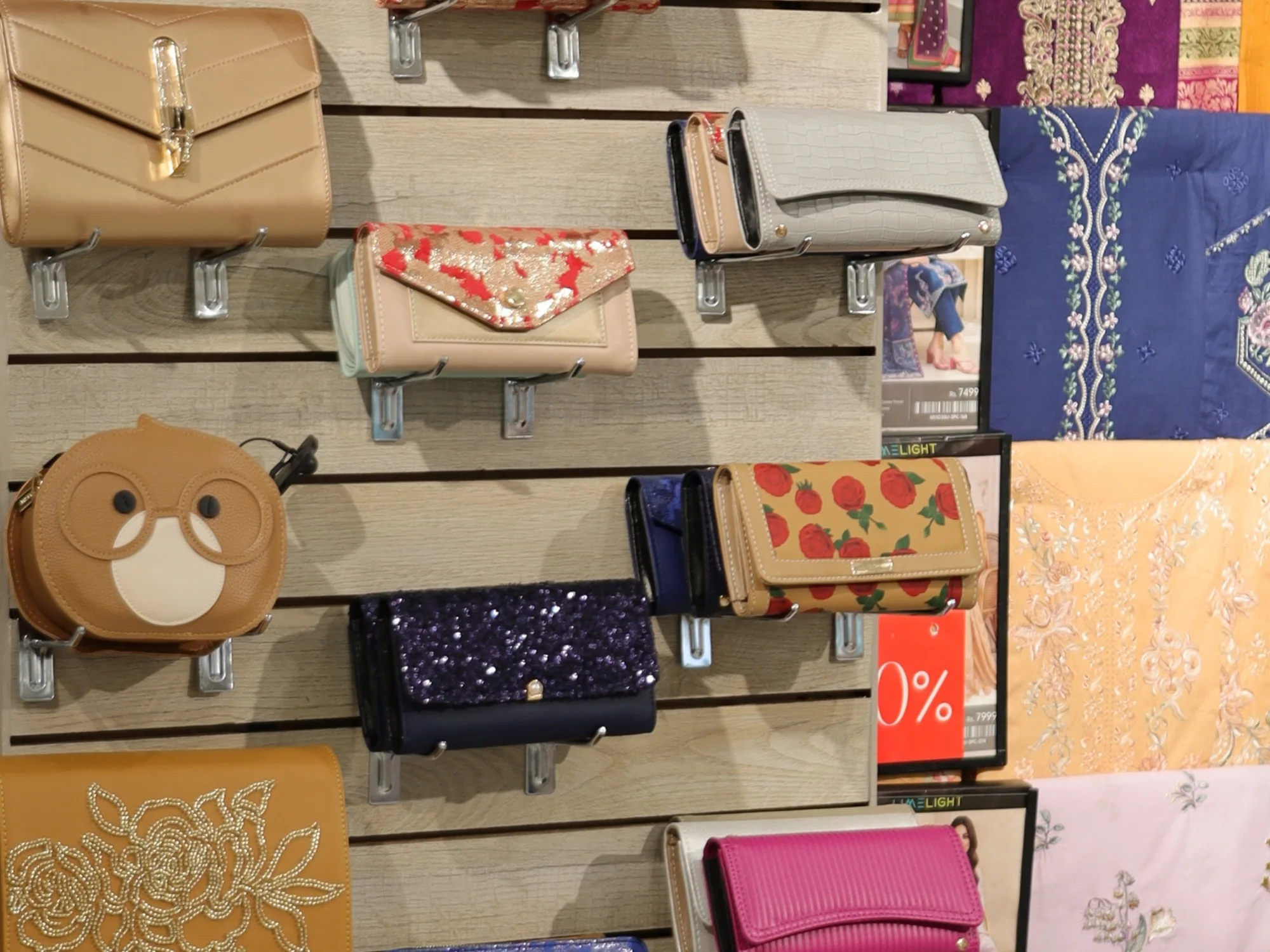 Clutches and purses on the Limelight accessories wall