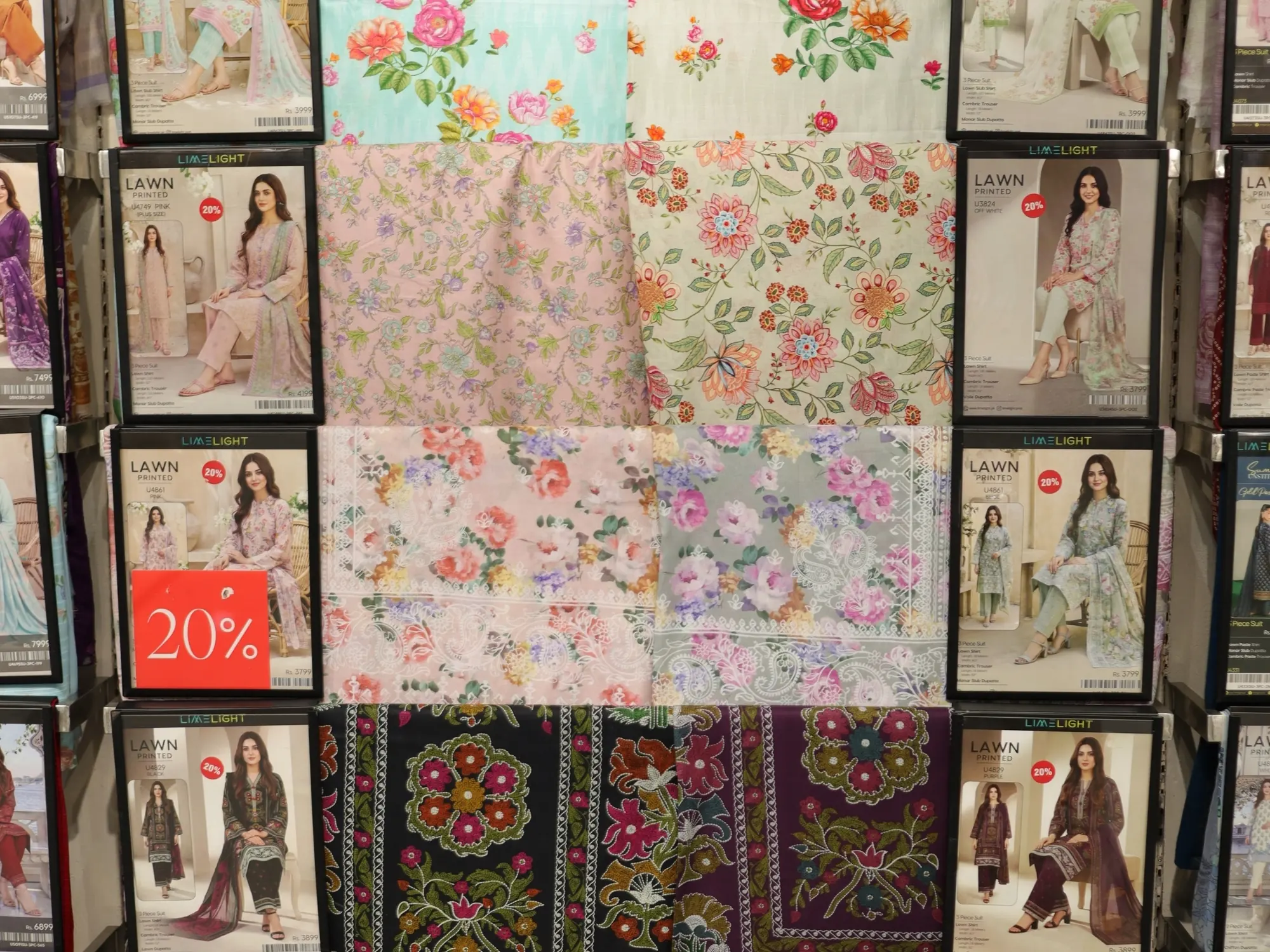 Boxed unstitched suits on the Limelight wall display