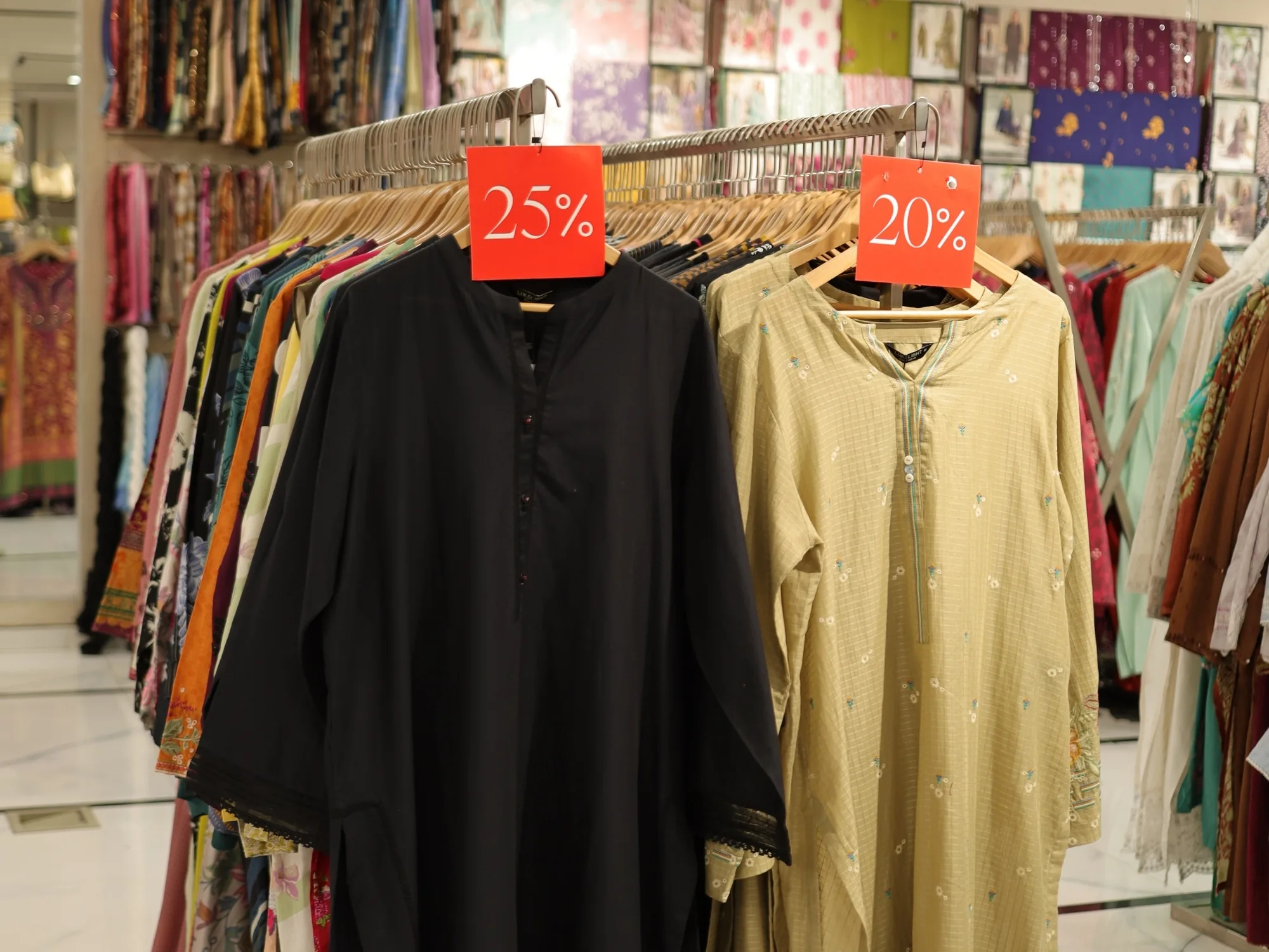 Kurtas on a Limelight rail marked twenty-five per cent off