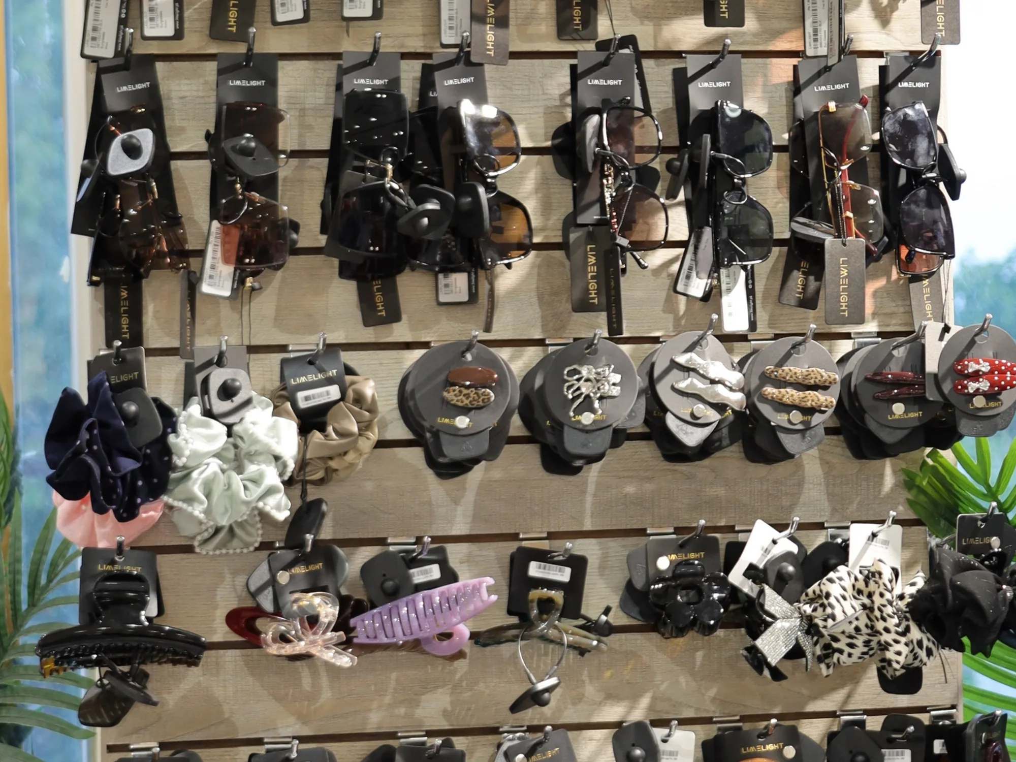 Bags and backpacks on the Limelight accessories wall