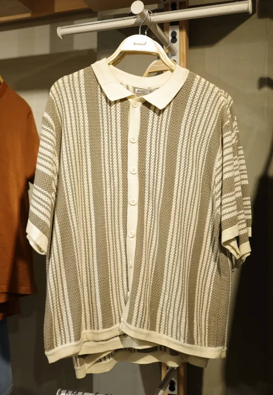 A striped shirt on a hanger at BREAKOUT