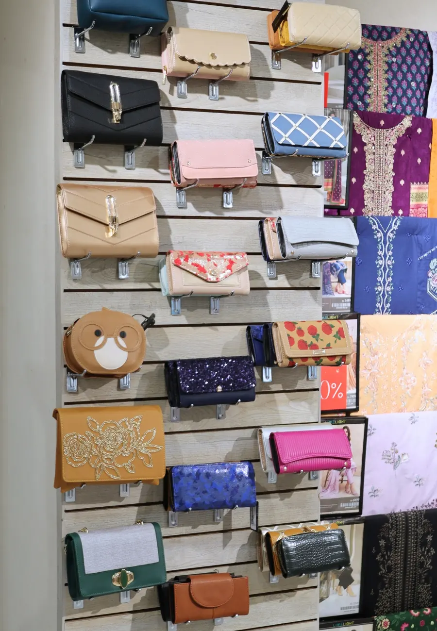 Clutches and purses on the Limelight accessories wall