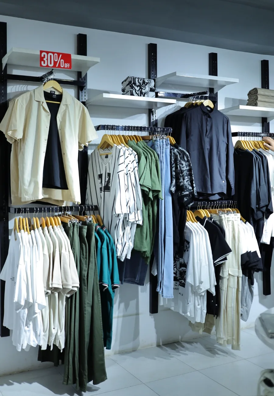 The ONE shop floor during a sale, rails marked thirty per cent off